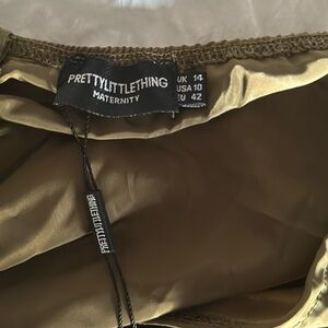 Green maternity pants, USA size 10. NEVER WORN. MINT CONDITION.